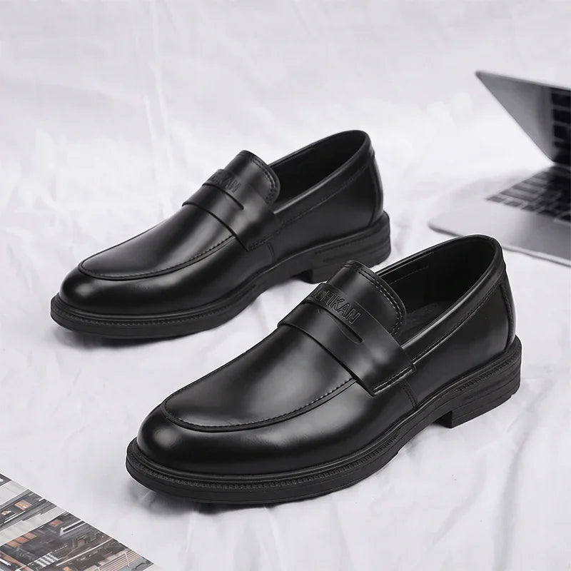 Men's black business loafers with thick sole, close-up