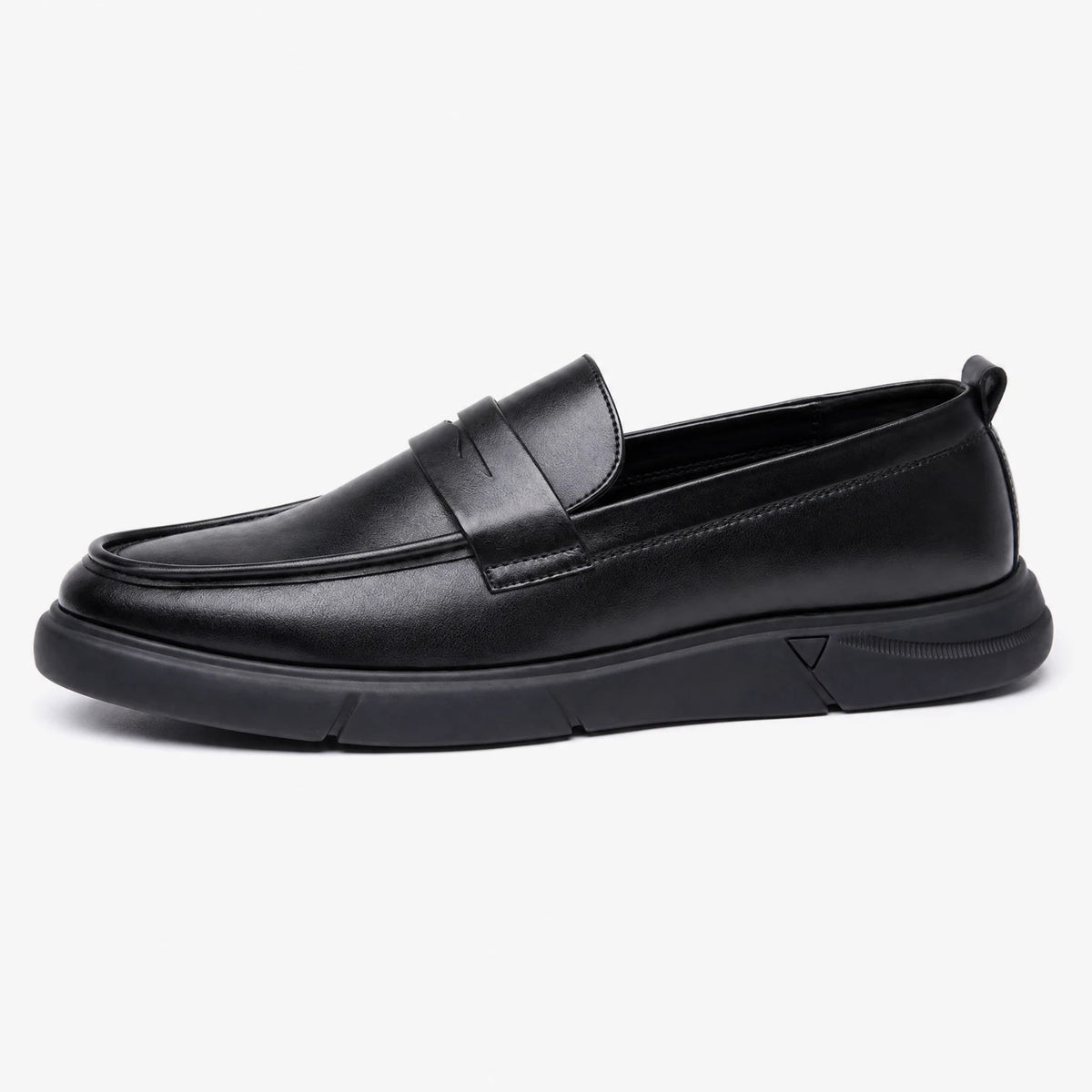Men's black platform moccasins with decorative tab, side view