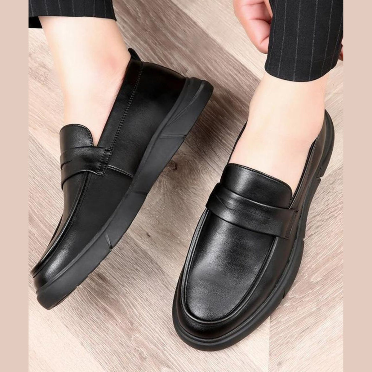 Black platform moccasin, back view