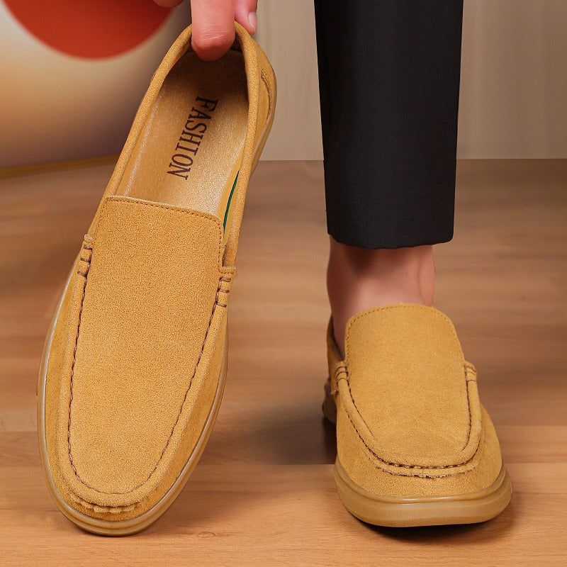 Men's flexible lugged-sole slip-on loafer, black styled with an outfit