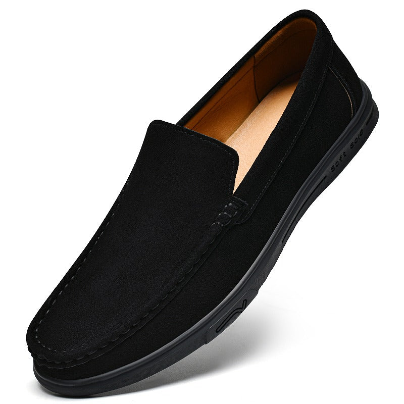 Men's flexible lugged-sole slip-on loafer, black pair seen from above