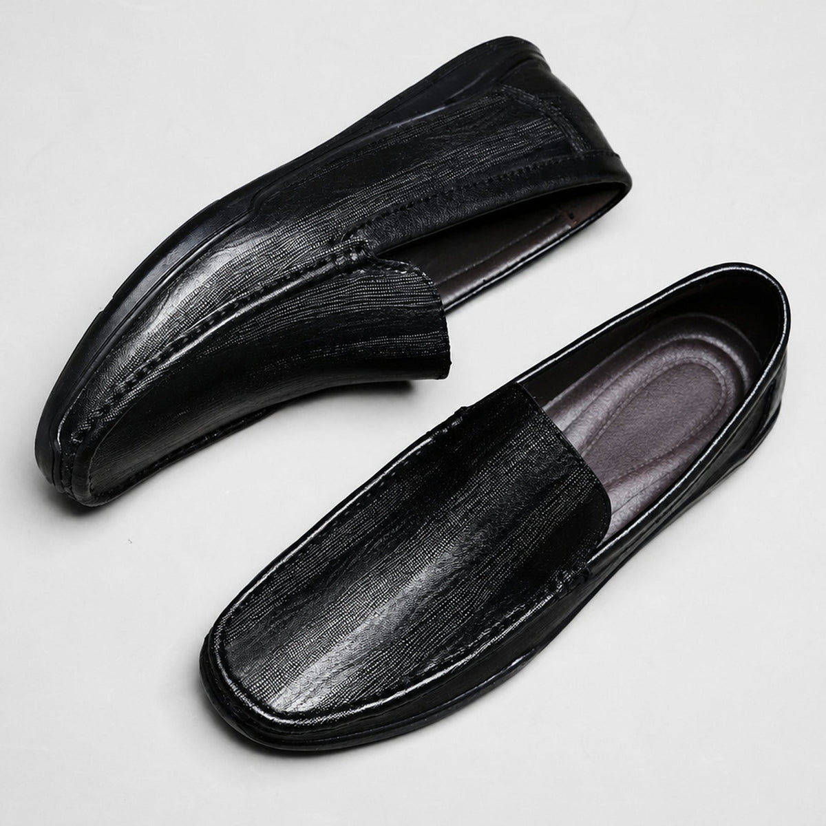 Black smooth leather slip-on loafer
