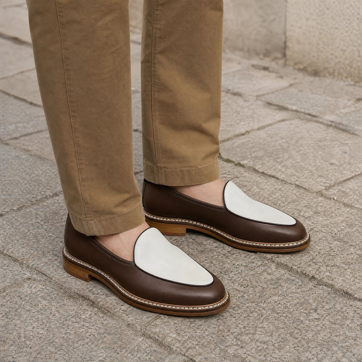 Men's dress loafer with visible stitching, black top view