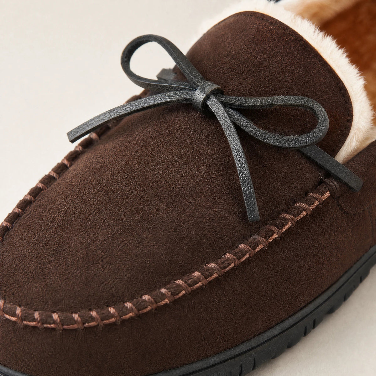 Brown faux suede moccasins with decorative lace Image