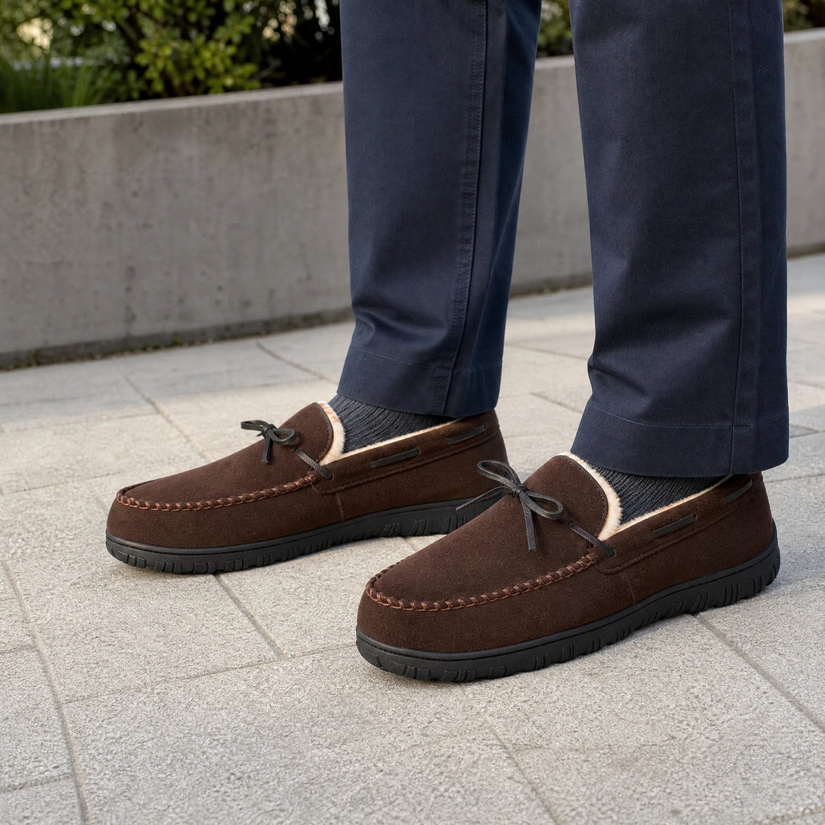 Fur-lined moccasins with white and fire-colored faux fur