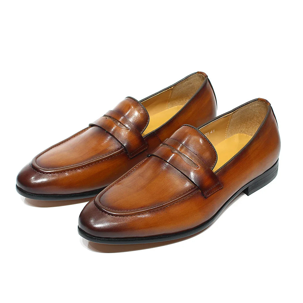 Men's hand-patinated leather penny loafer in Dark brown