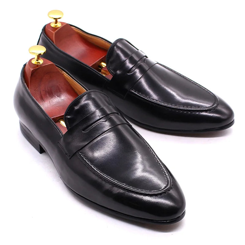 Men's hand-patinated leather penny loafer in Dark brown