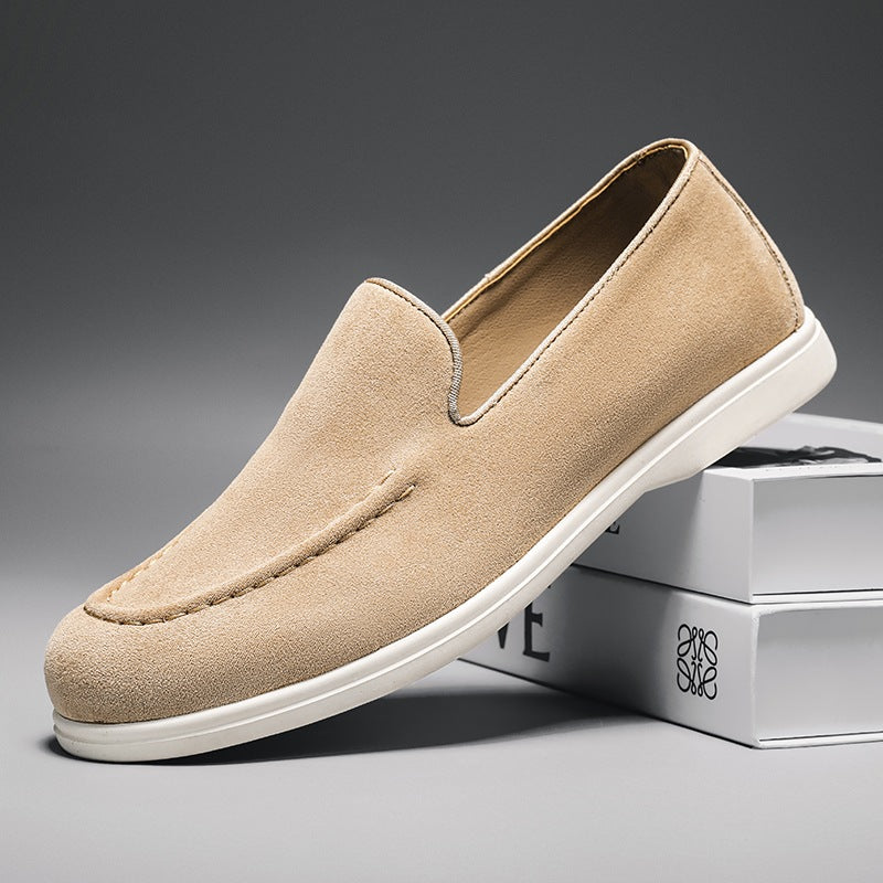 Men's black and beige slip-on loafer with white sole, beige three-quarter view