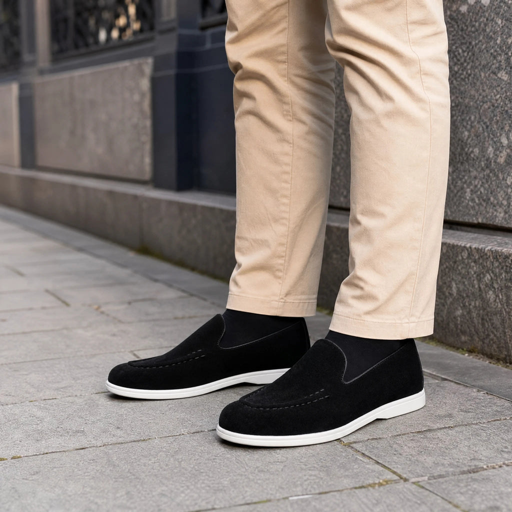 Men's black and beige slip-on loafer with white sole, black top view