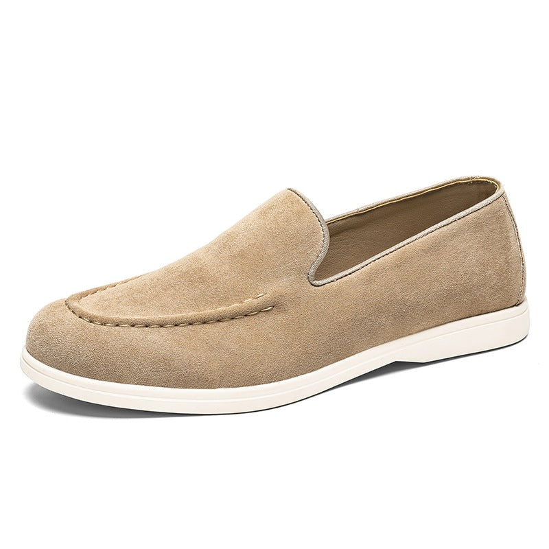 Men's black and beige slip-on loafer with white sole, beige worn on foot