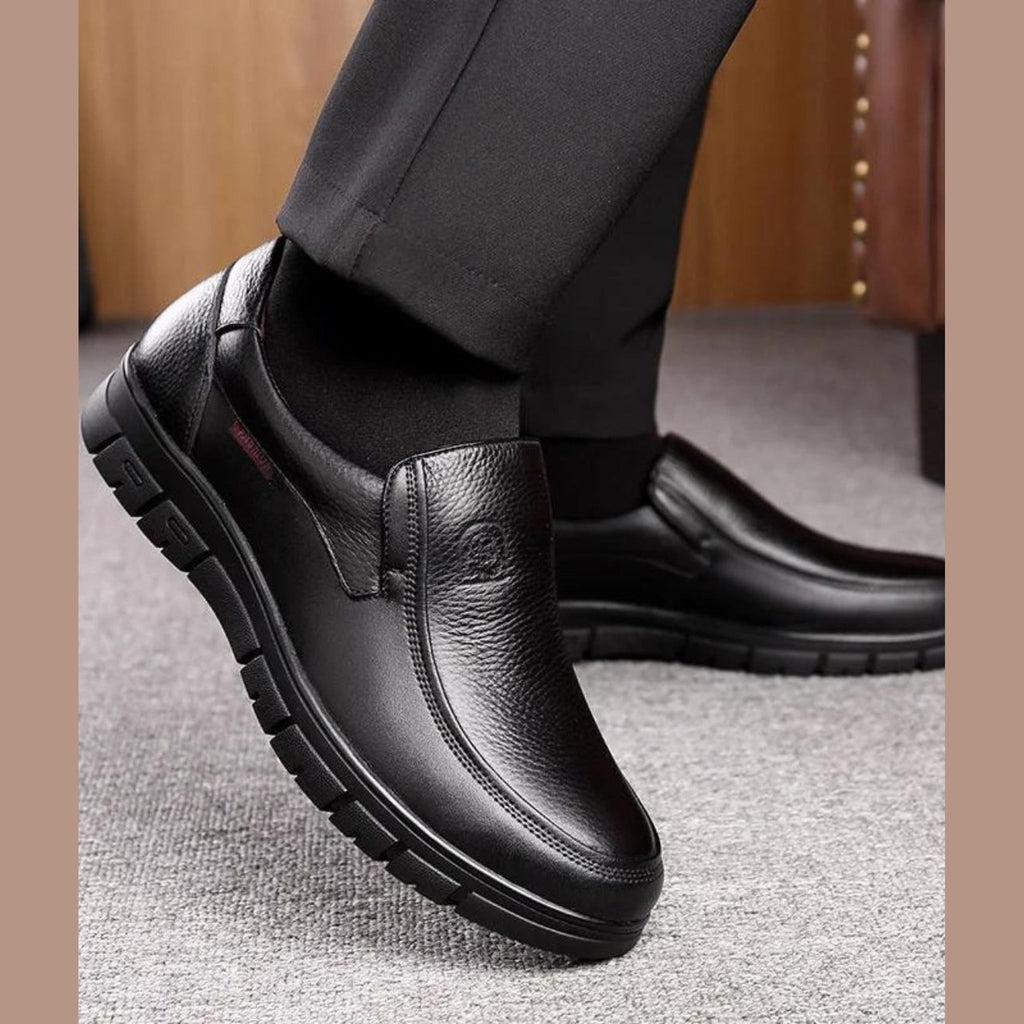 Men's black loafer worn with jeans