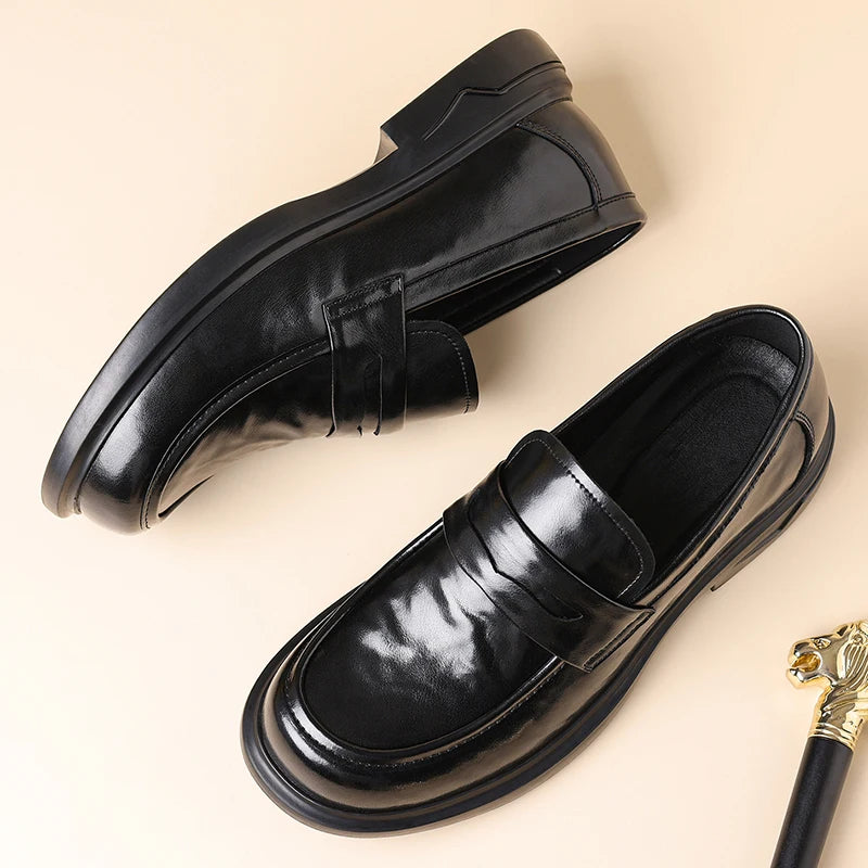 Black penny loafer, top view