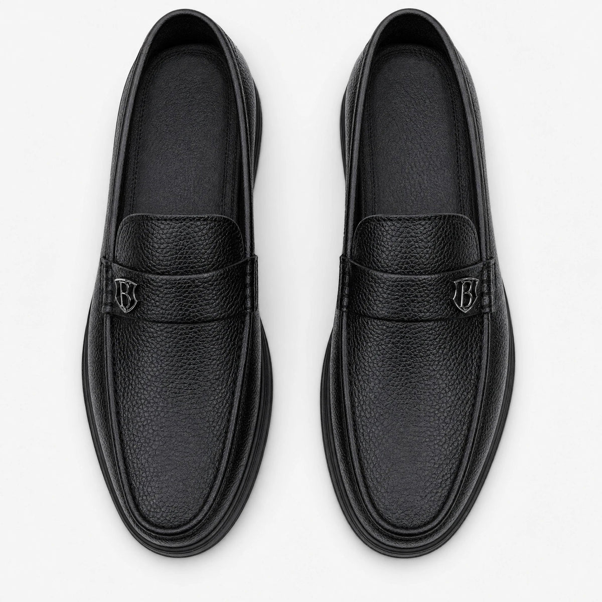 Men's black grained leather thick-sole moccasins, side view