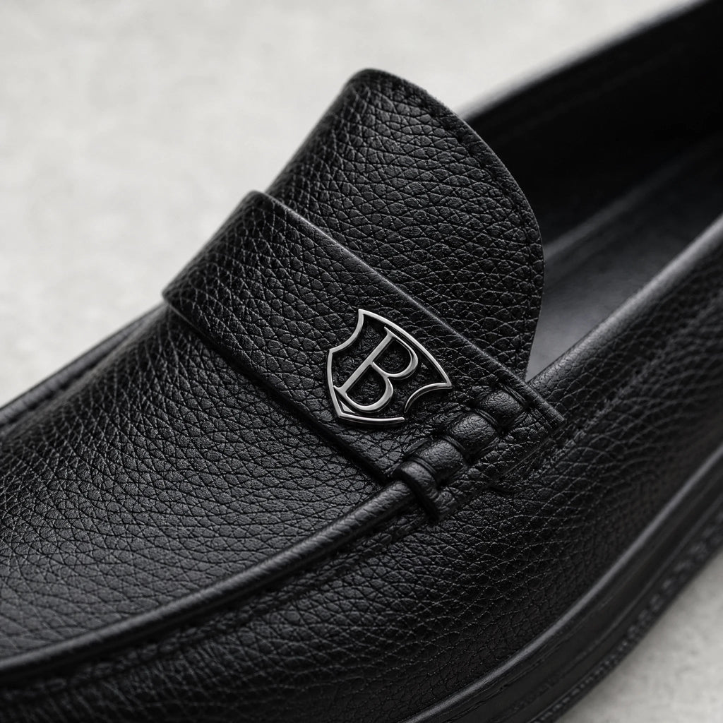 Black grained leather moccasin with support tab