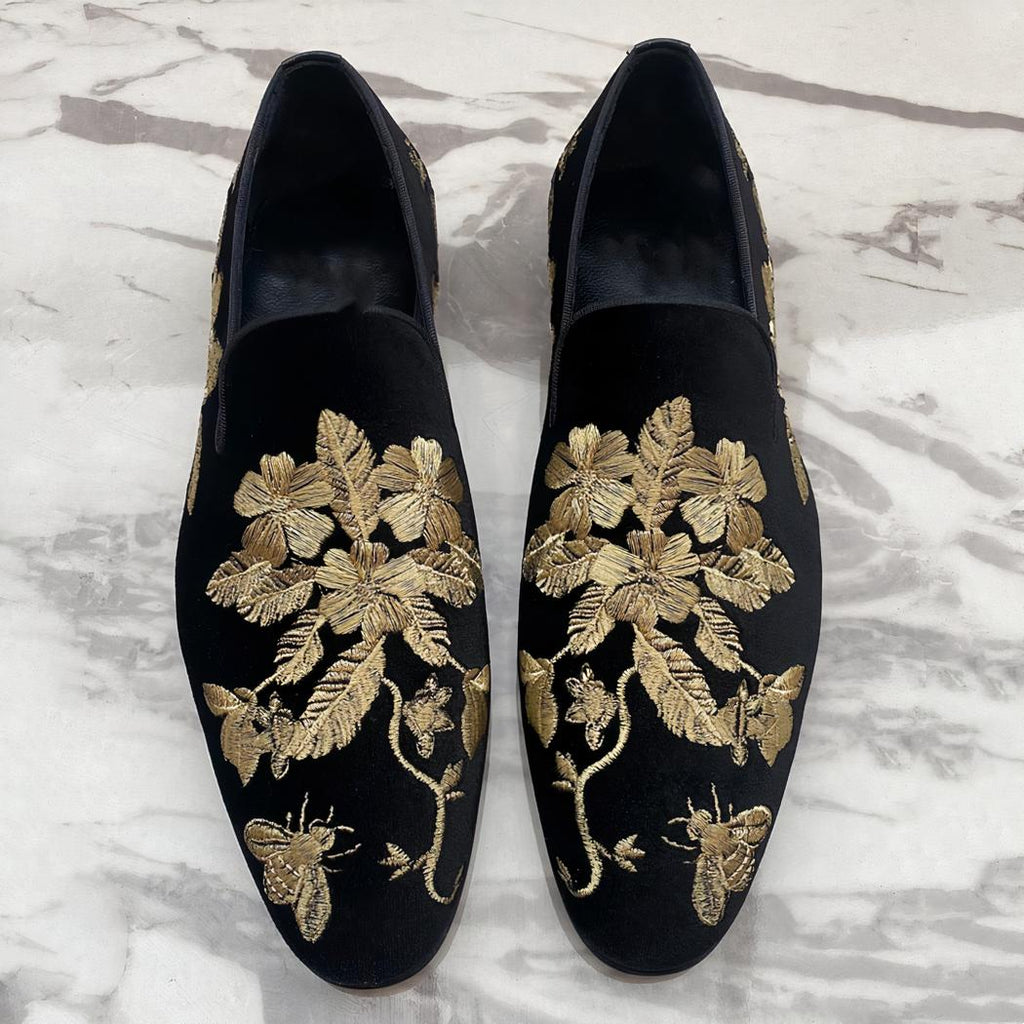 Black velvet loafers with gold floral embroidery