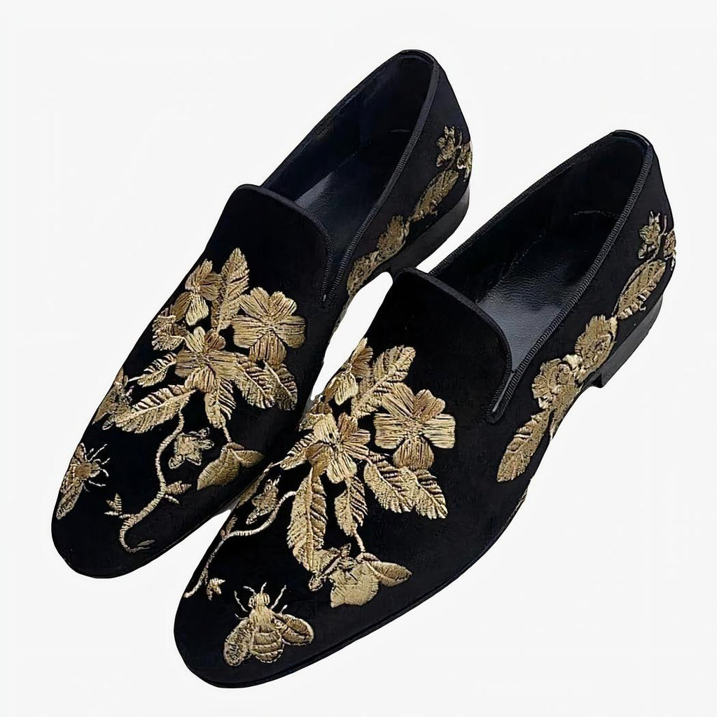 Black velvet loafers with gold floral embroidery
