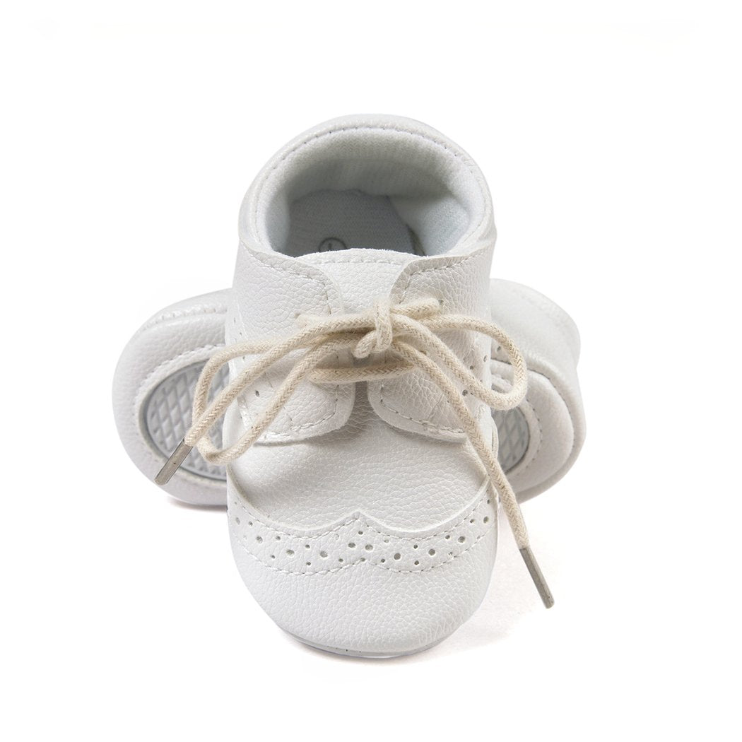 Moccasins with laces and soft sole for baby boys
