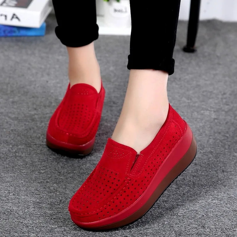 Open-weave platform loafers with wedge sole in Navy Blue, worn view