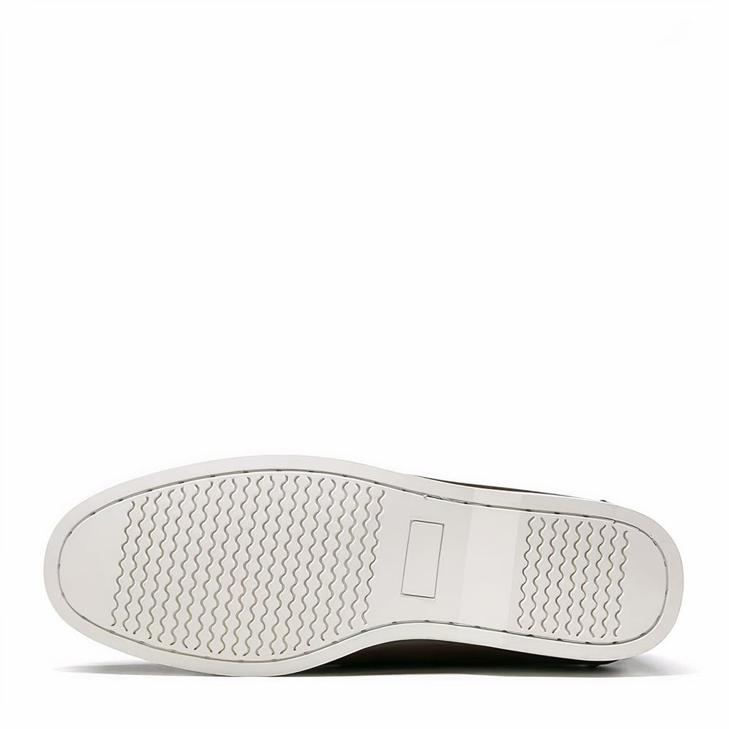 Photo of a white boat loafer sole on a white background