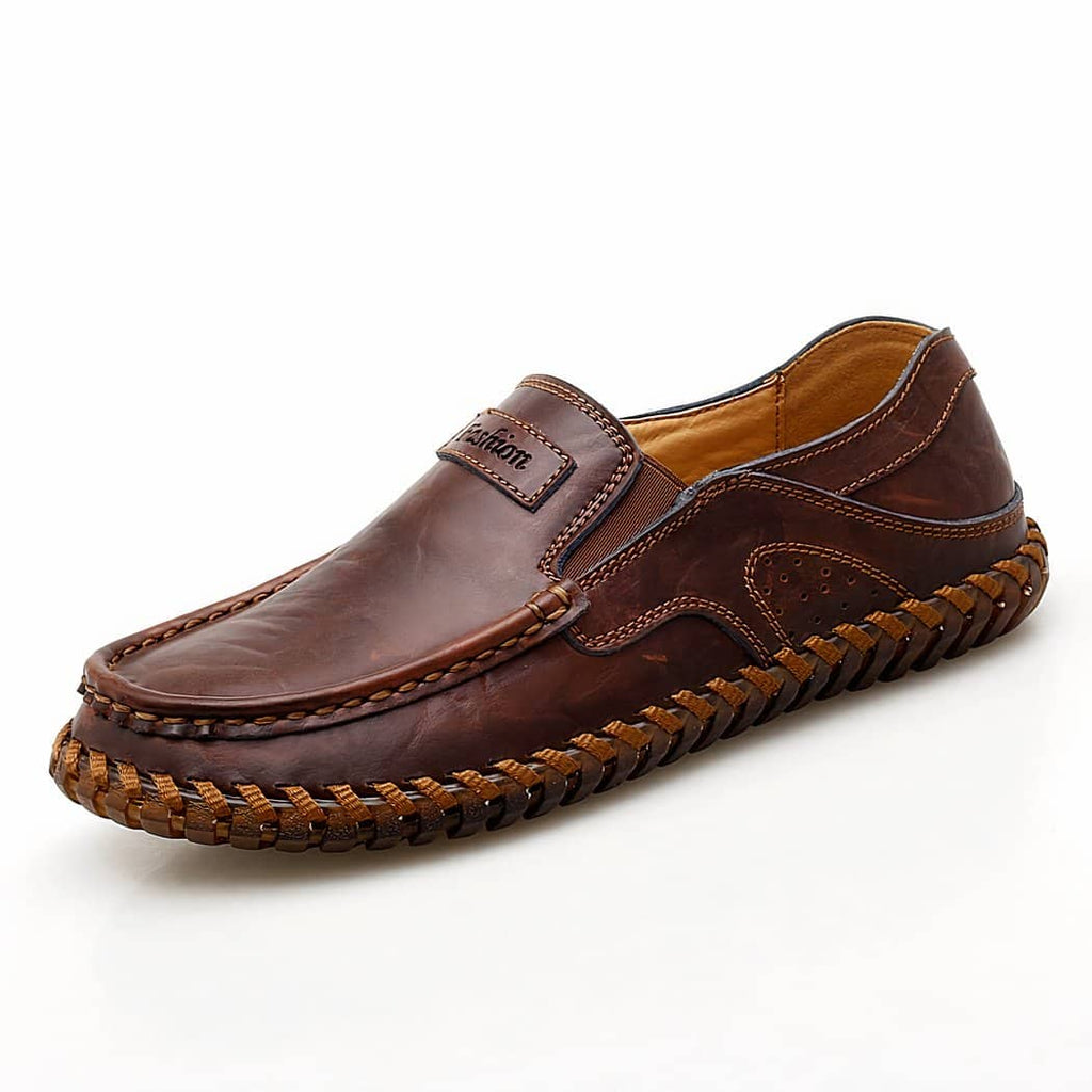 Brown loafer on white background.