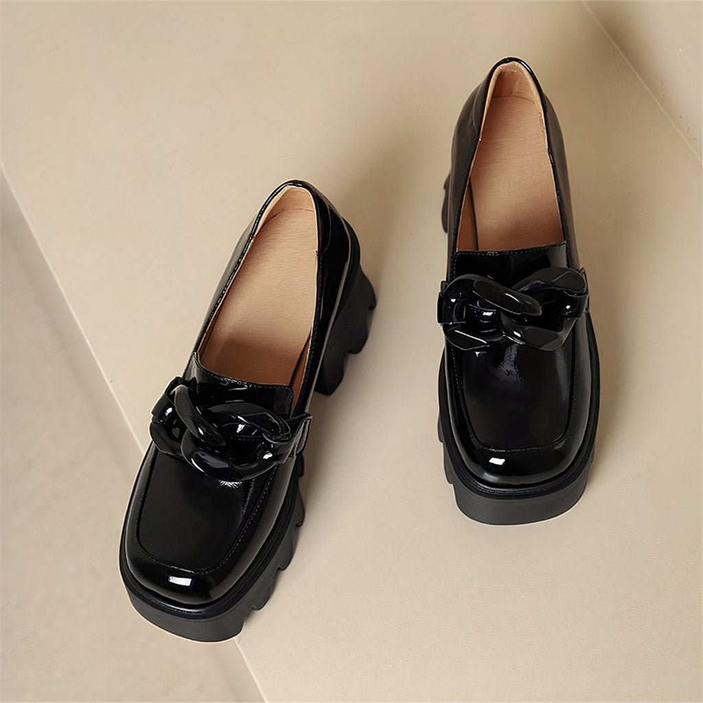 Patent loafers with thick sole and big buckle