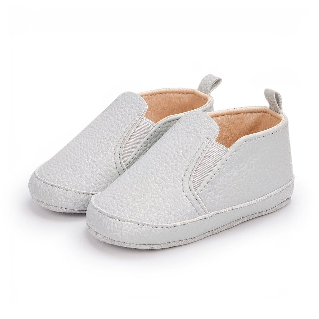 Plain synthetic leather slip-on moccasins for babies