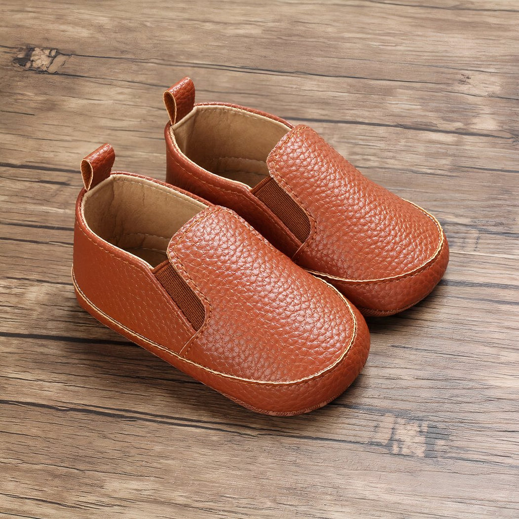 Plain synthetic leather slip-on moccasins for babies