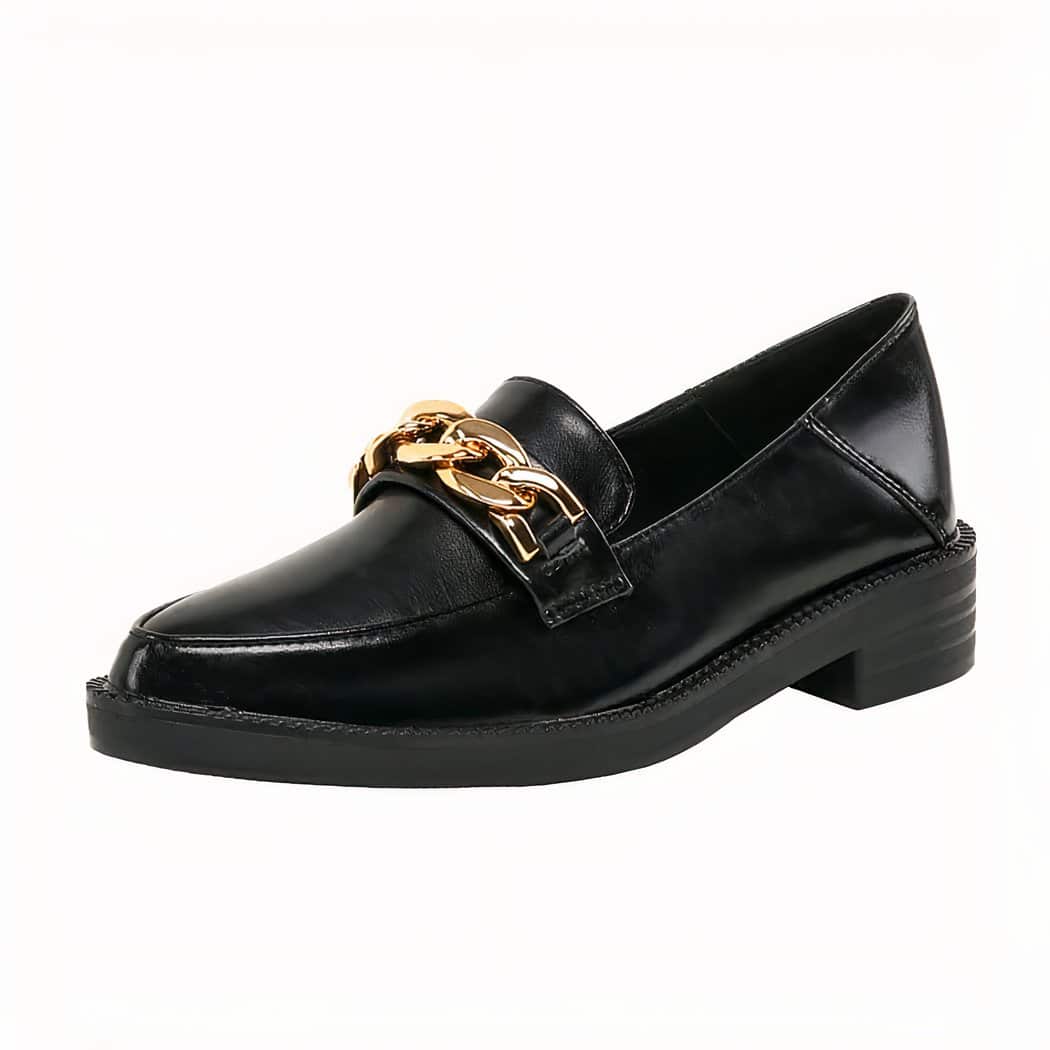 Black patent leather loafer with decorative gold chain on a white background
