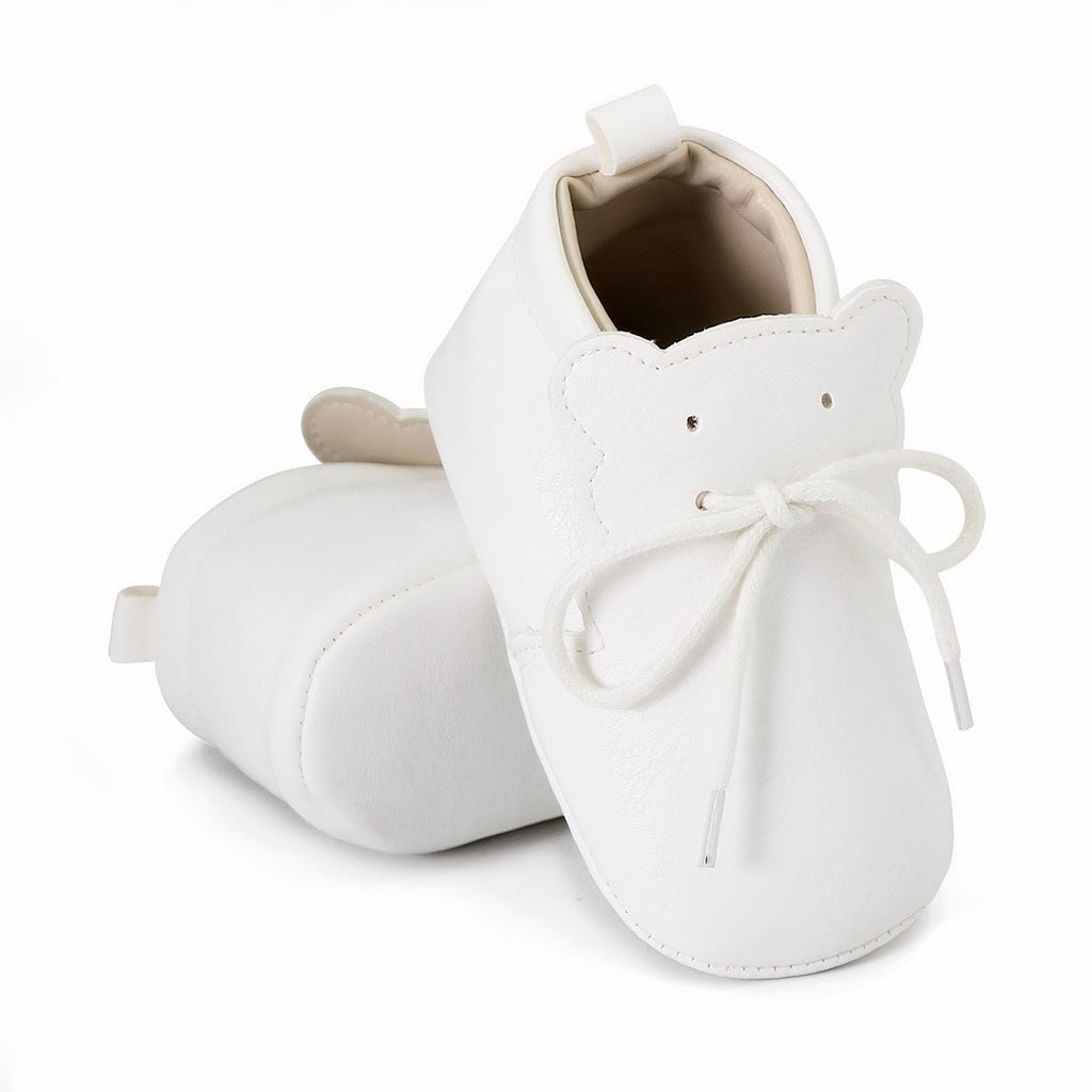 Soft baby moccasins with laces and teddy bear shape