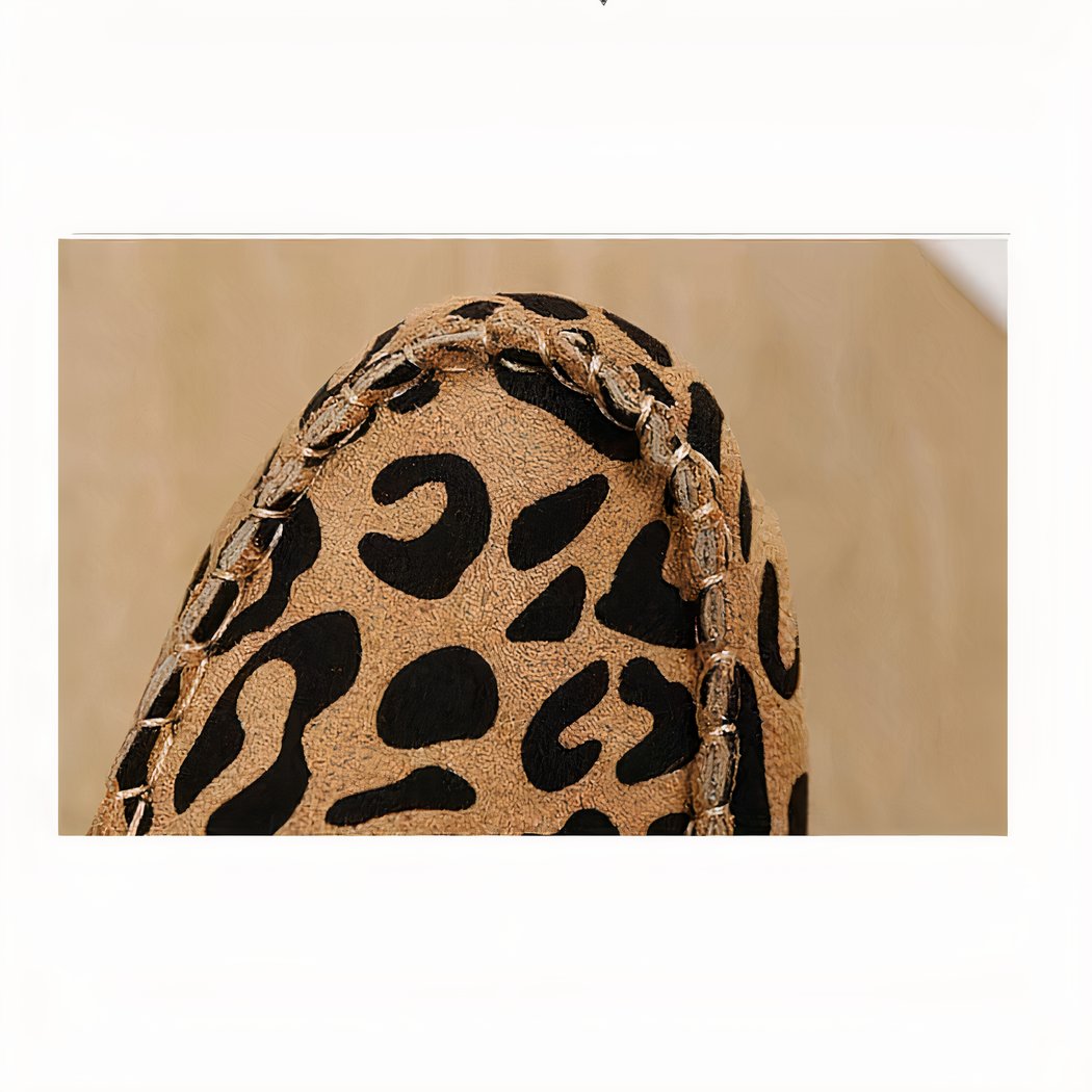 Soft leopard print loafers with rhinestone rings