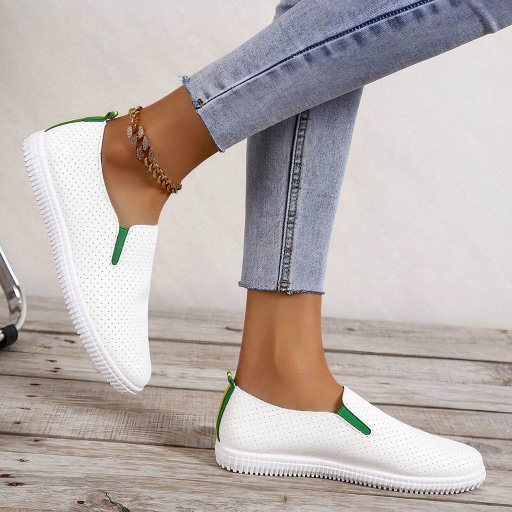 Soft loafers in perforated white synthetic leather