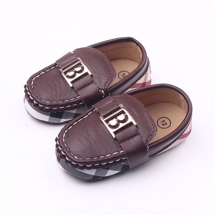 Soft moccasins with check and gold decoration for baby