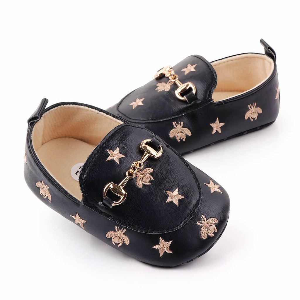 Star motif loafers