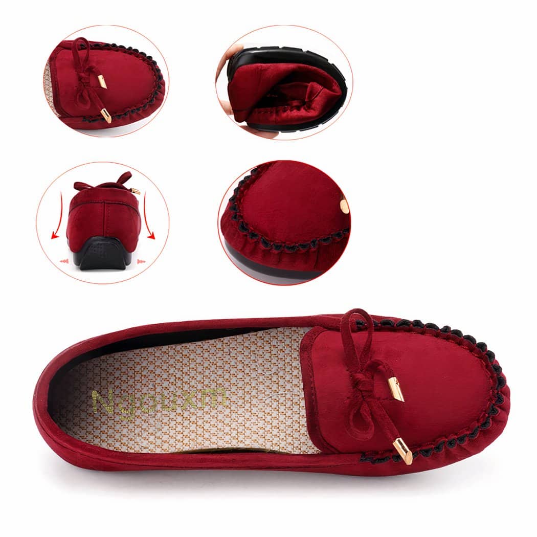 red suede loafer on women's feet