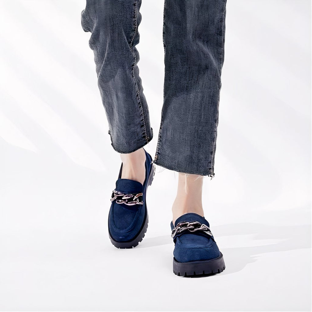 Suede loafers with gold buckle and thick sole