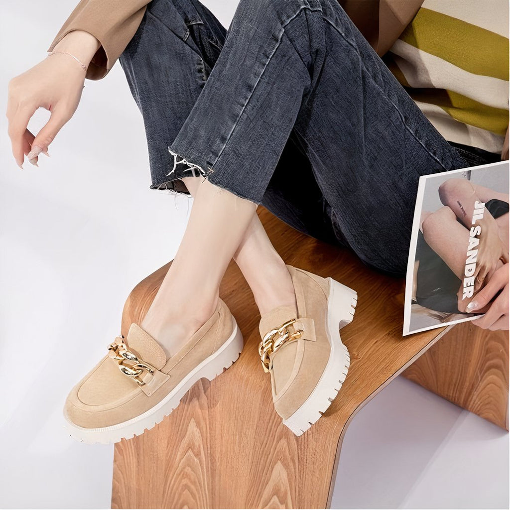 Suede loafers with gold buckle and thick sole