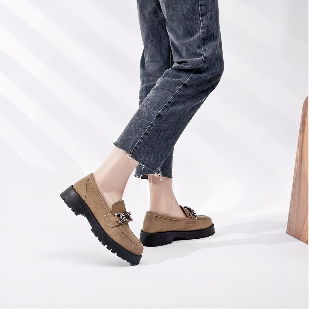 Suede loafers with gold buckle and thick sole