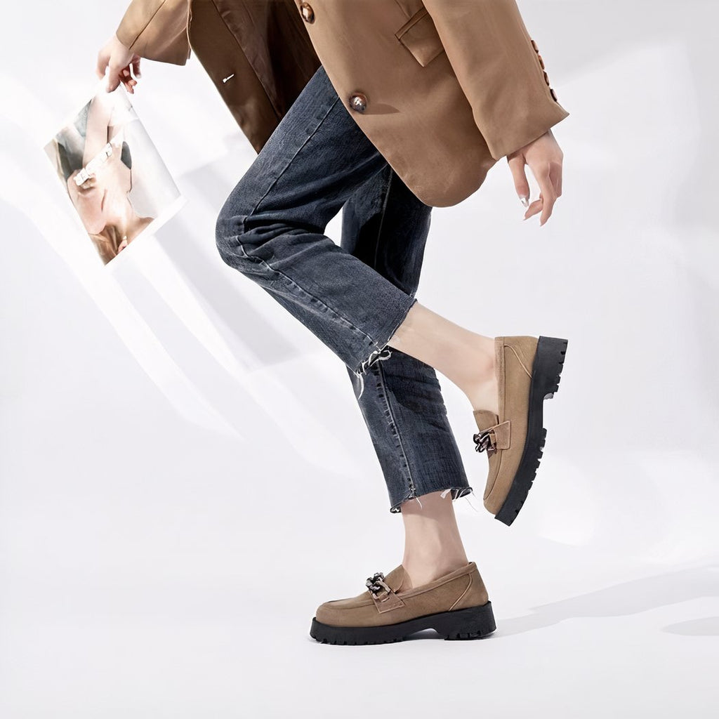 Suede loafers with gold buckle and thick sole