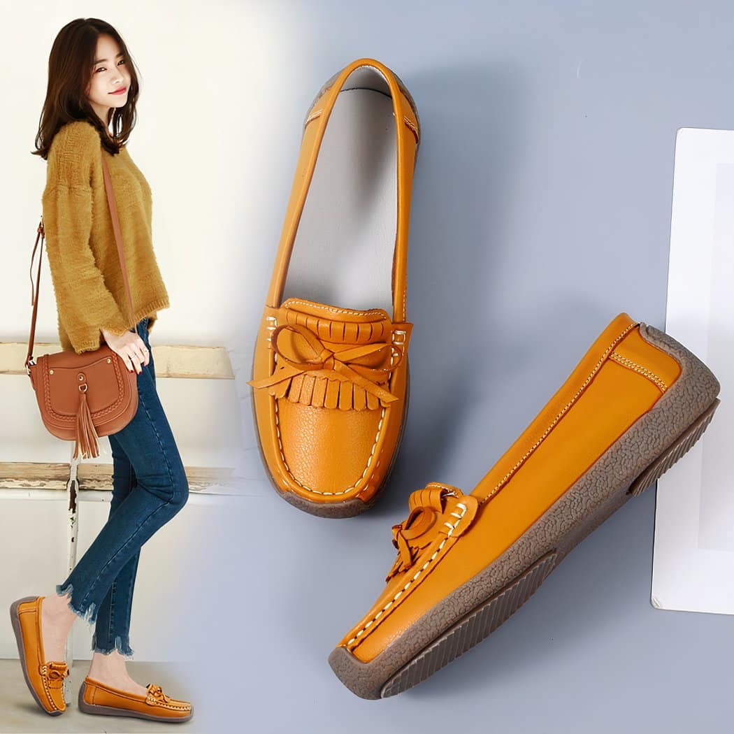 Synthetic leather loafers with fringe and bow