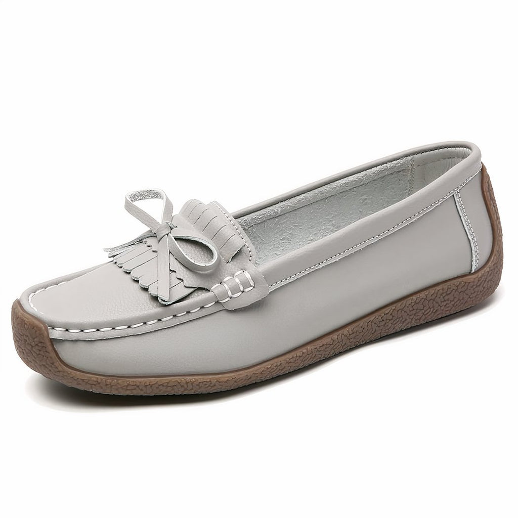 Synthetic leather loafers with fringe and bow