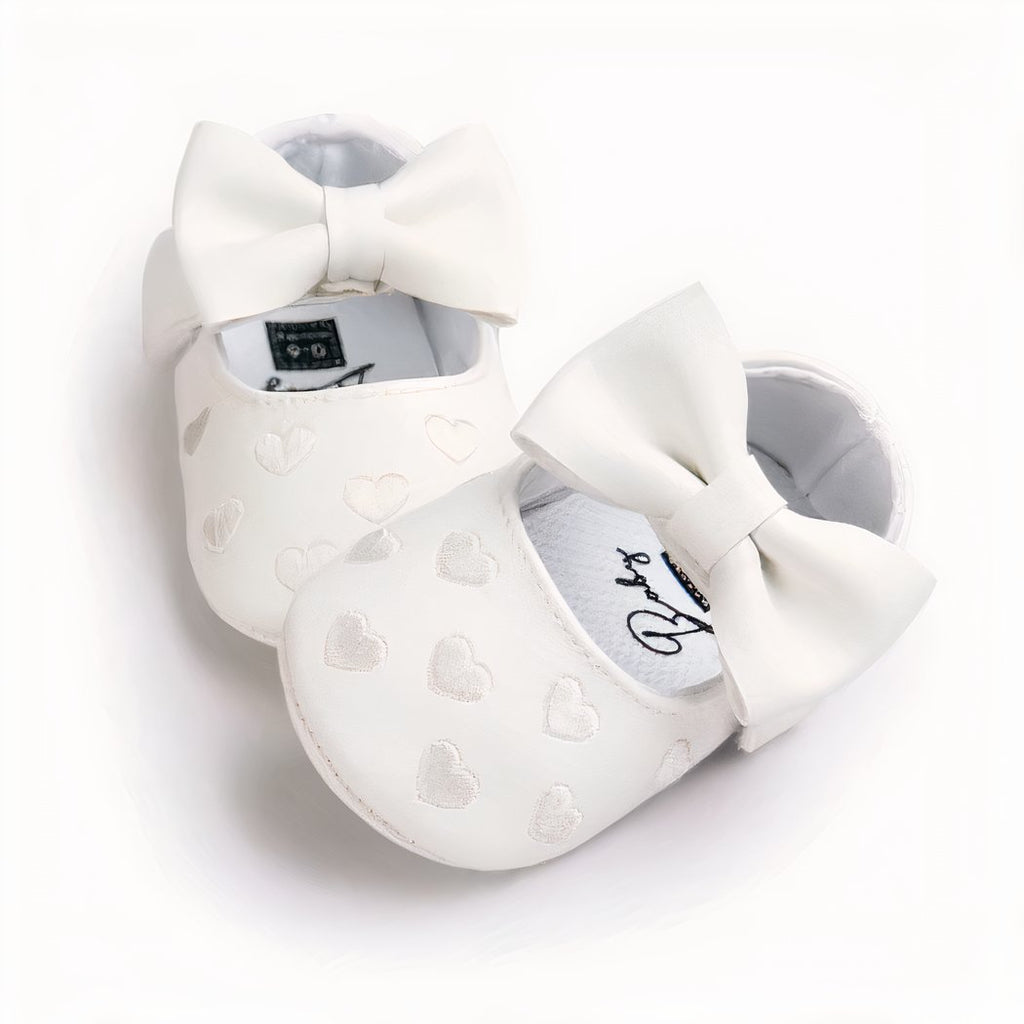Synthetic leather loafers with heart motif