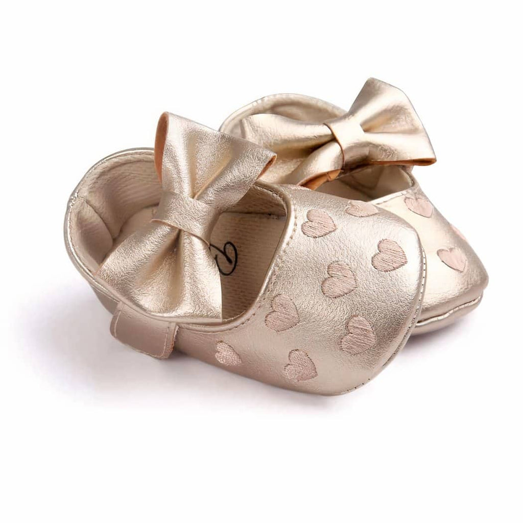 Synthetic leather loafers with heart motif