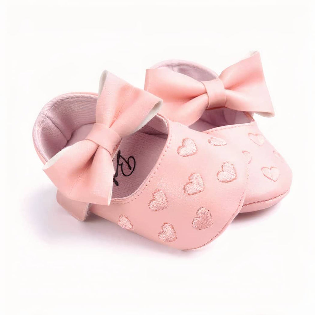 Synthetic leather loafers with heart motif