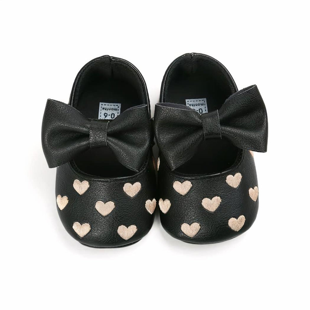 Synthetic leather loafers with heart motif