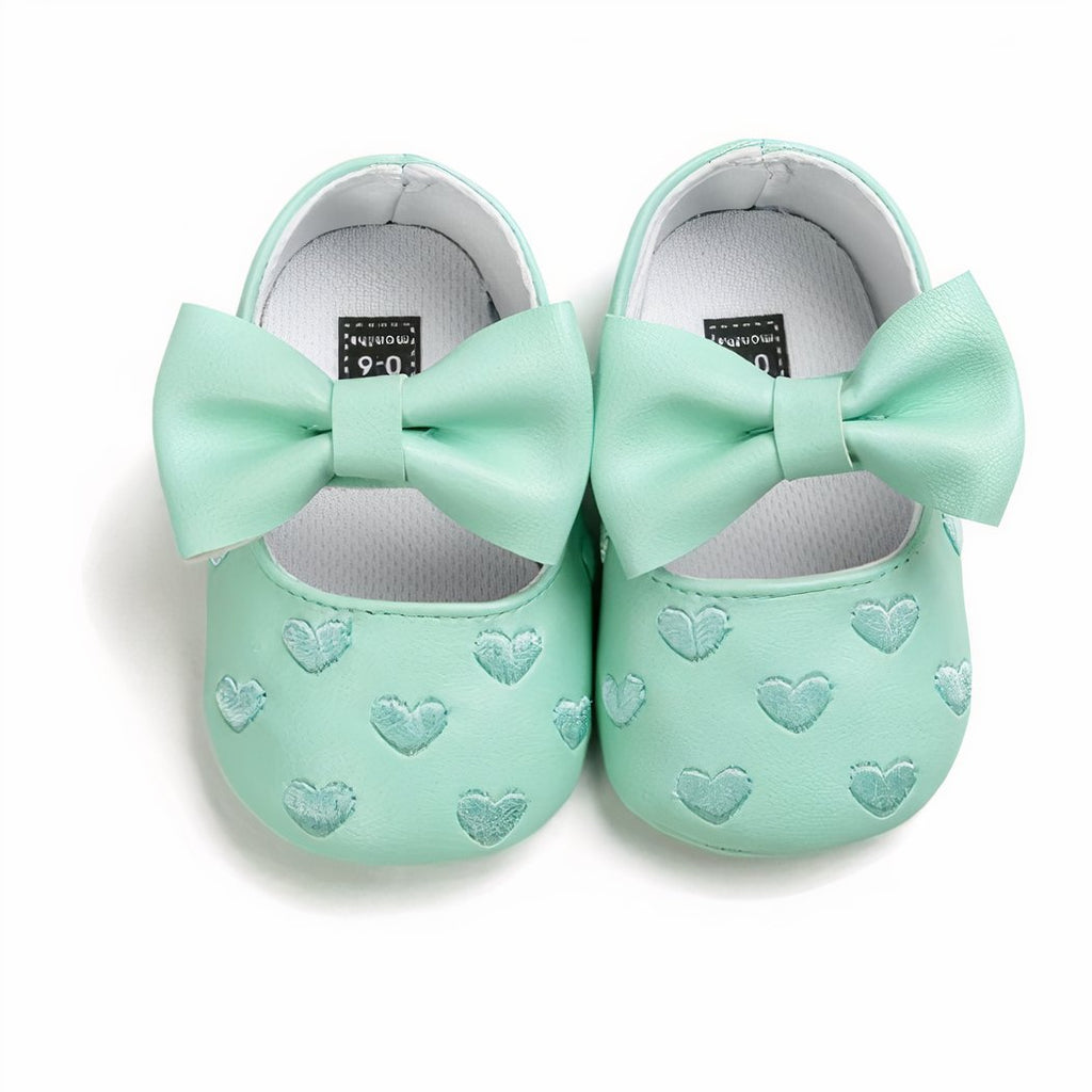 Synthetic leather loafers with heart motif