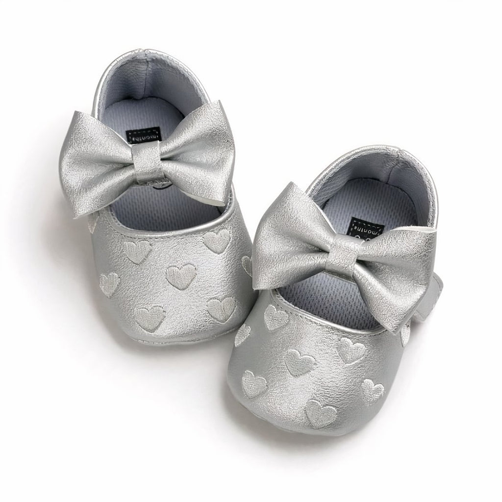 Synthetic leather loafers with heart motif