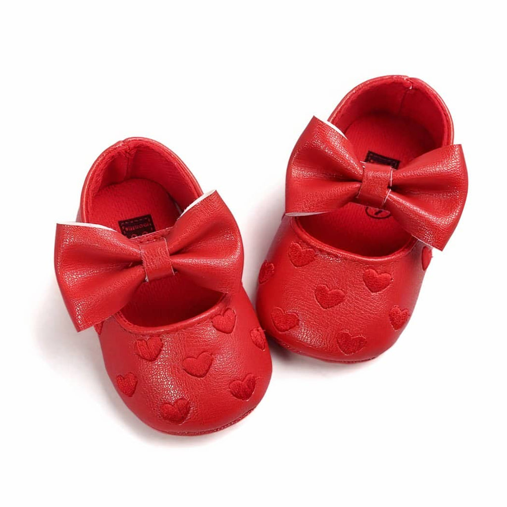 Synthetic leather loafers with heart motif