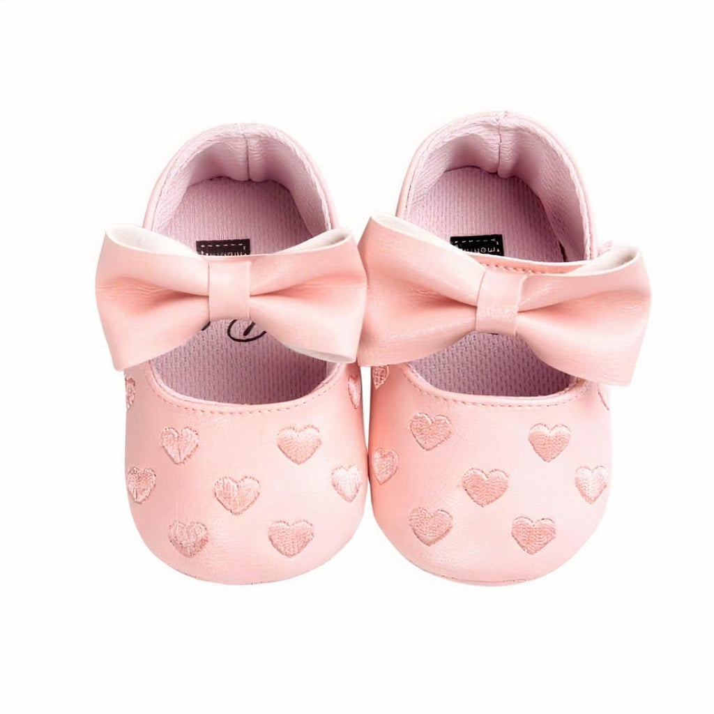 Synthetic leather loafers with heart motif