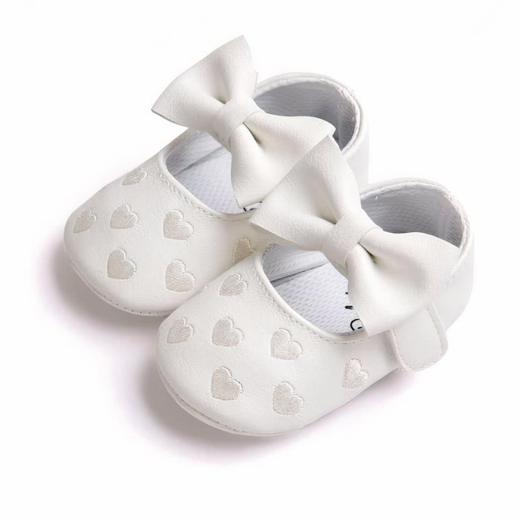 Synthetic leather loafers with heart motif