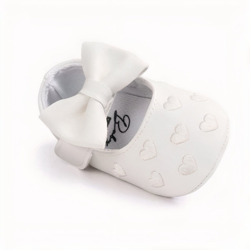 Synthetic leather loafers with heart motif